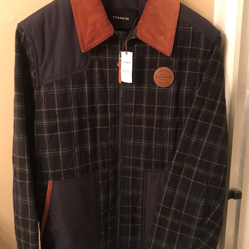 Men’s Coach jacket XL never worn still with tags and nice garment bag.